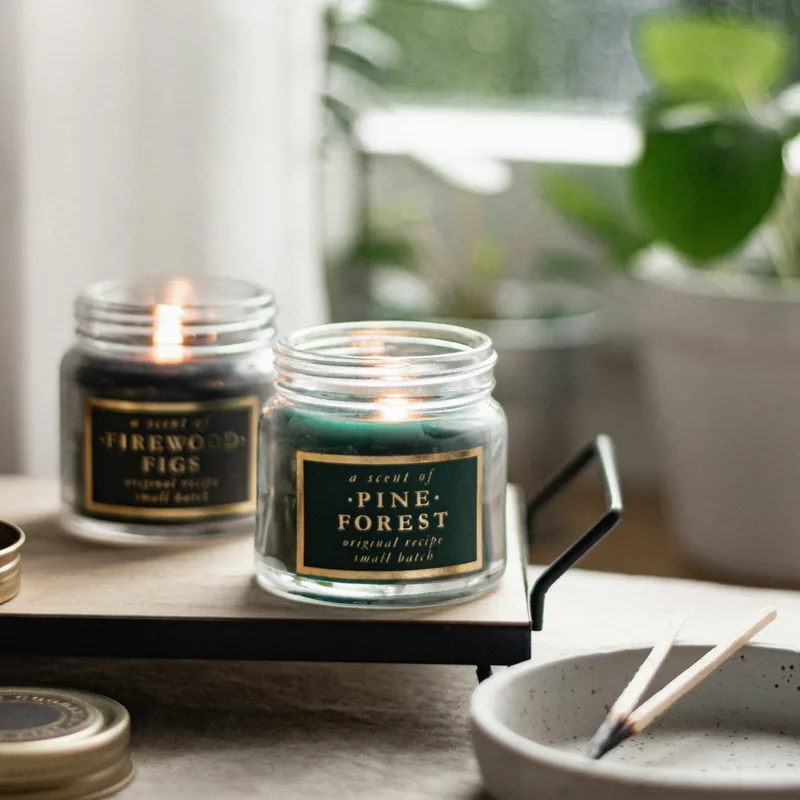 Original photo: two small clear jars labelled Firewood Figs and Pine Forest